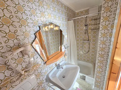 Gemütliches Bett im Doppelzimmer der Ferienwohnungen Luttinger