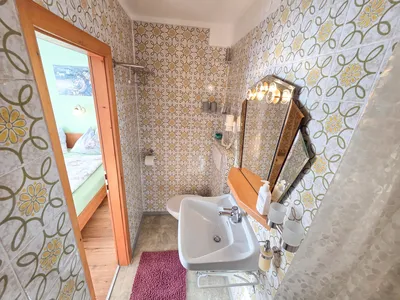 Gemütliches Bett im Doppelzimmer der Ferienwohnungen Luttinger